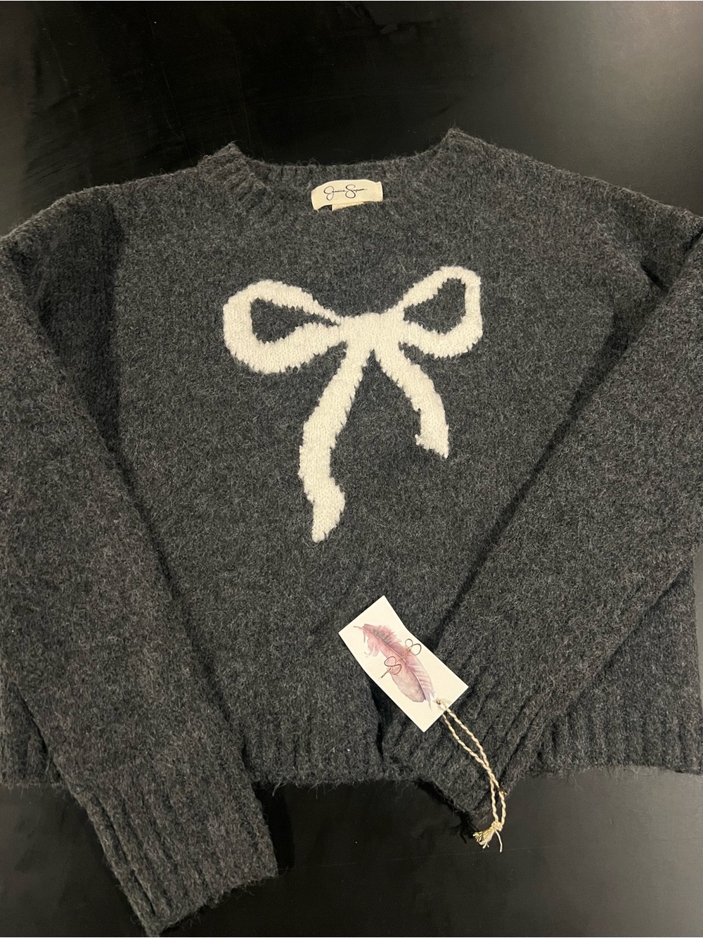 Jessica Simpson Dark Gray Crewneck Sweater with White Bow Intarsia